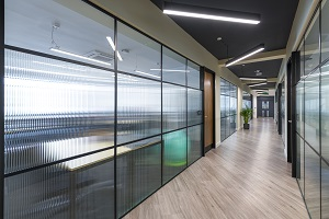QIC trims Glass Partition